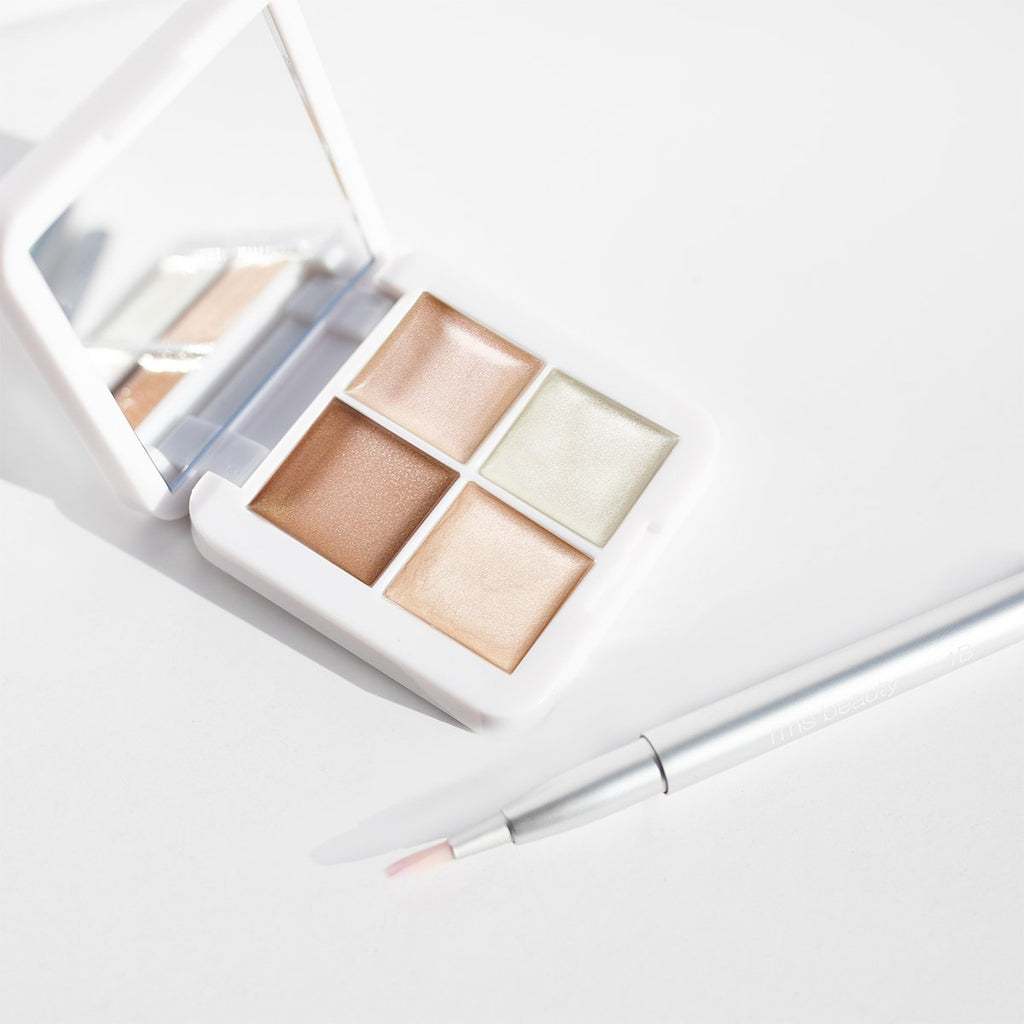 Living Luminizer Glow Quad Mini - Polished Daily Care